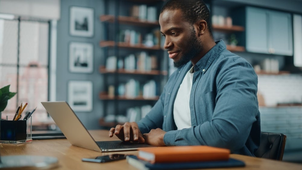 A man checking information online about DC chargers.