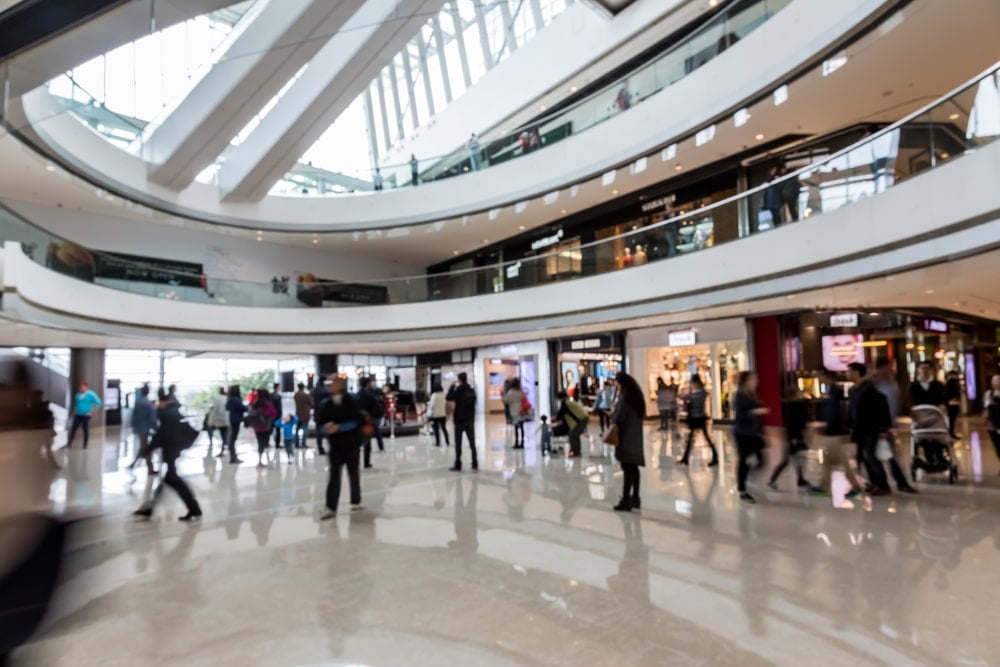 the interior of a high-end shopping mall.