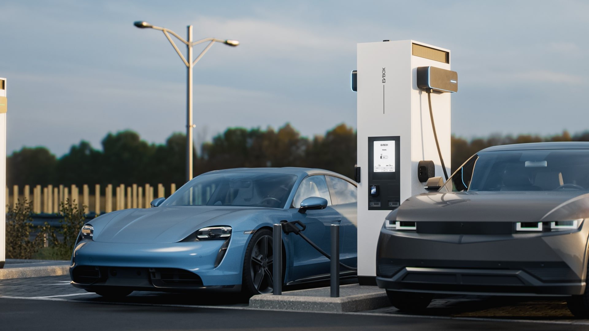 Two cars are being charged with EVBox Troniq Modular DC charging station.