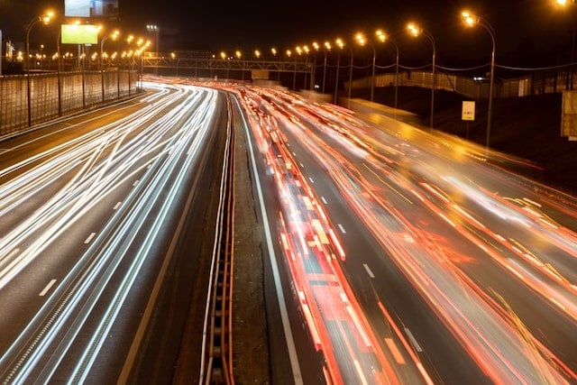 Many cars on a busy road. 