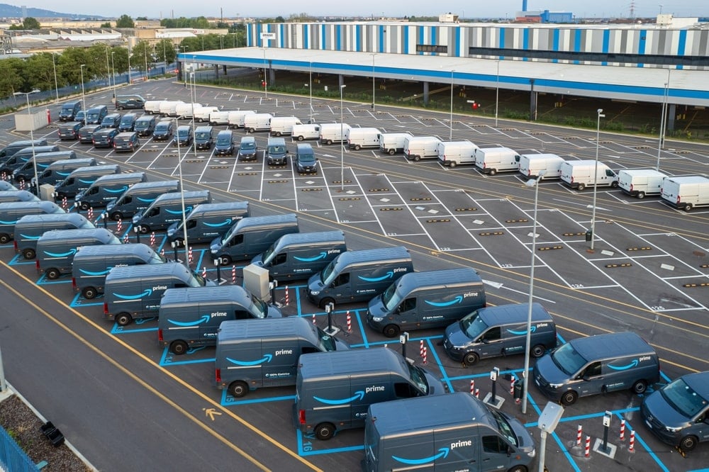 A fleet of Amazon electric LCV at their depot.