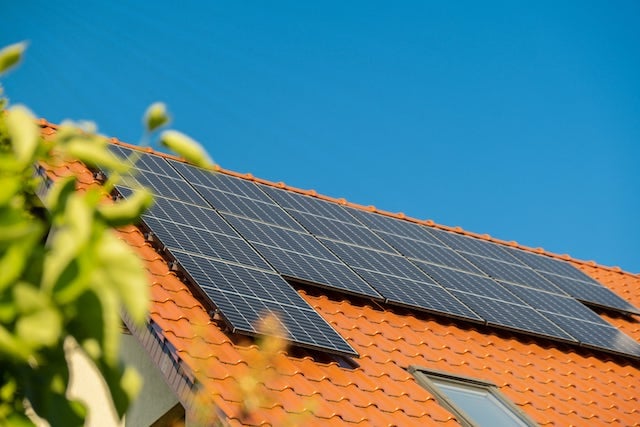 An orange roof filled with solar panels