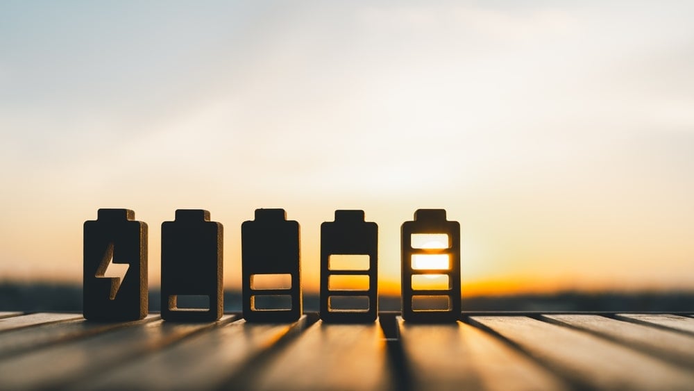 Five art pieces in the shape of battery are shining under the sun.