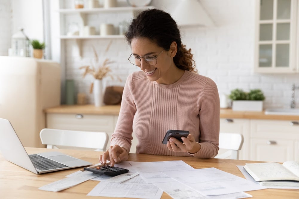 A businesswoman is calculating her return on investment.