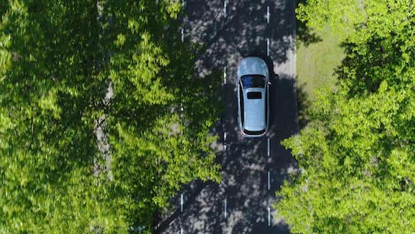 An EV car is running on the road.